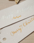 An example of modern calligraphy on Christmas gift tags, per the Lettering Guide: Christmas Gift Tags by Gemma Milly