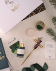 The Calligraphy Pen Gift Set – including the Bloom, oblique, in Dark Mulberry, the One-Dip-Wonder, Calligraphy ink and Tilt ink pot.