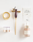 Contents of the Calligraphy Pen Gift Set: the Bloom calligraphy pen,, the One-Dip-Wonder, calligraphy ink and Tilt ink pot.