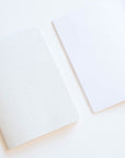 Tom's Studio x Coffeenotes A5 Notebook in 'Grounds' white, with plain pages, made from recycled coffee cups and eco-friendly materials.