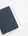 Tom's Studio x Coffeenotes A6 Notebook in Black, with dotted pages, made from recycled coffee cups and eco-friendly materials.