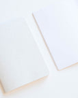 Tom's Studio x Coffeenotes A6 Notebook in 'Grounds' white, with plain pages, made from recycled coffee cups and eco-friendly materials.