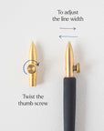 The One-Dip-Nib in Brass, shown fitted in the Original Flourish Straight Calligraphy Pen demonstrating how to adjust line width