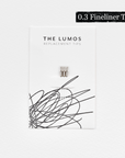 A pack of three Lumos 0.3mm fineliner replacement tips attached to a white backing card. The card features 'THE LUMOS REPLACEMENT TIPS' in uppercase black letters at the top, with an abstract black ink scribble design in the lower half. A black textured label in the upper right corner displays '0.3 Fineliner Tip' in white text.