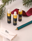 Contents of the Lumos Mini Gift Set including the Lumos Mini refillable pen in Ivy, Lumos Full Tip Set, the Studio Pad and set of three mini 5ml fountain pen inks