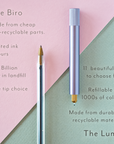 Comparison of a disposable biro and the Lumos Mini refillable pen (shown in Lilac)