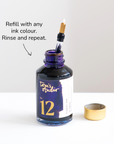 Image showing the Lumos reservoir being refilled from a bottle of Tom's Studio Fountain Pen Ink
