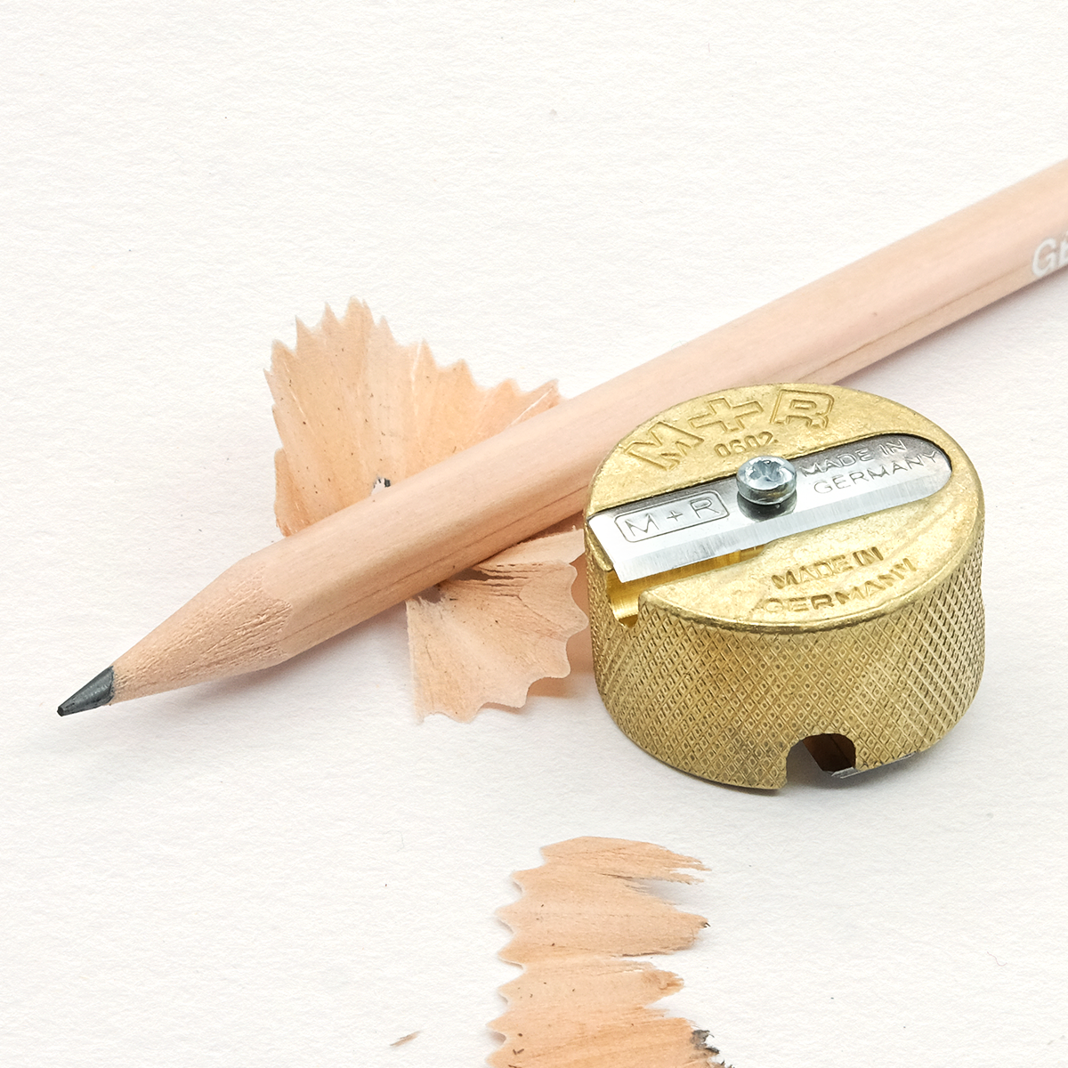 Möbius + Ruppert Brass Pencil Sharpener shown with a HB pencil