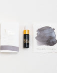 Tom's Studio Twinkle Twinkle Mini Shimmer Fountain Pen Ink – featuring the packaging, bottle with pipette in lid and swatch