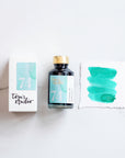 Tom's Studio Barrier Reef Shimmer Fountain Pen Ink – featuring the packaging, bottle and a swatch on paper