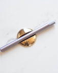 Solid Brass Pen Rest shown with Lumos Pro Duo pen in Lilac
