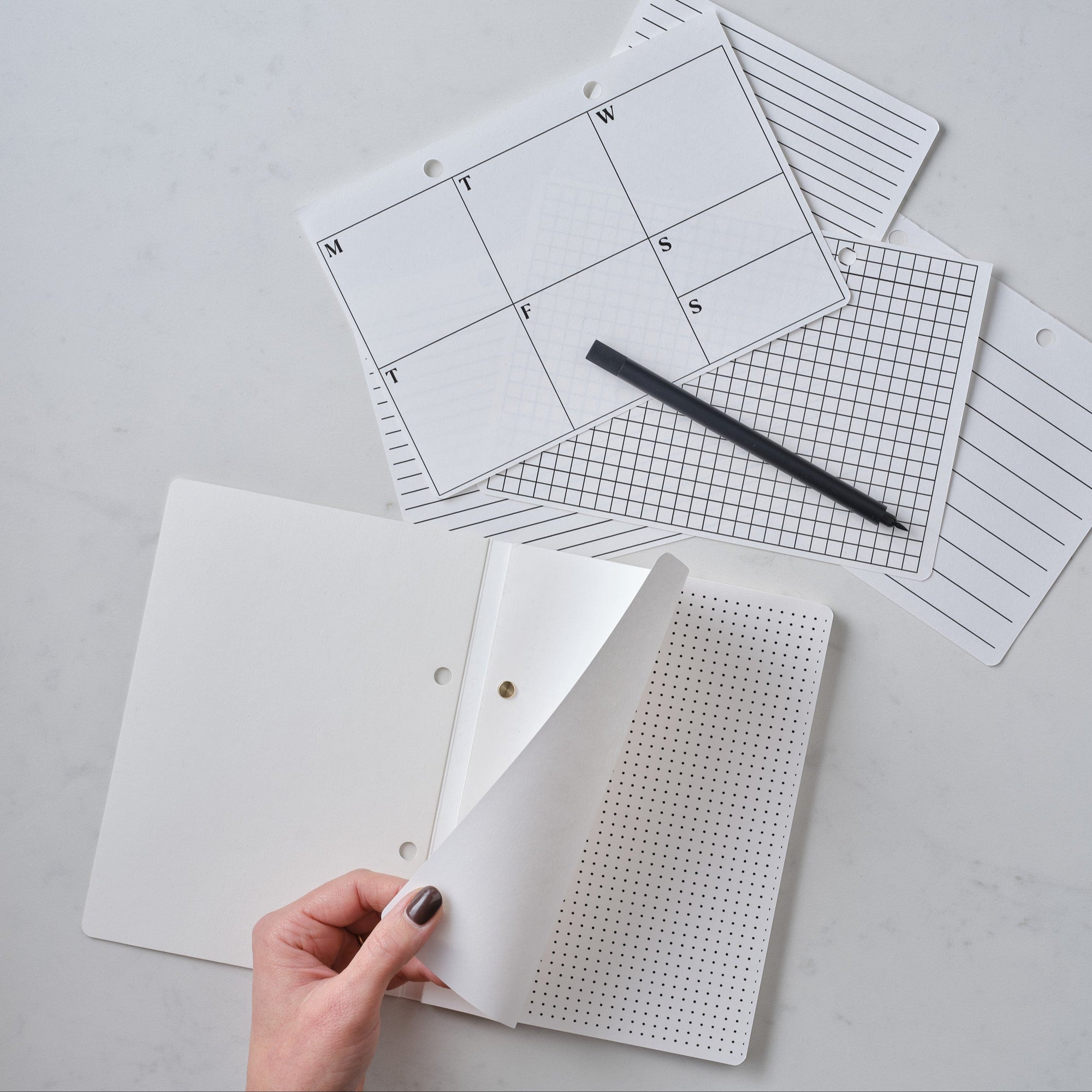 The Studio Pad refillable, customisable notebook and organiser with page guides for ruled, dotted and grid layouts