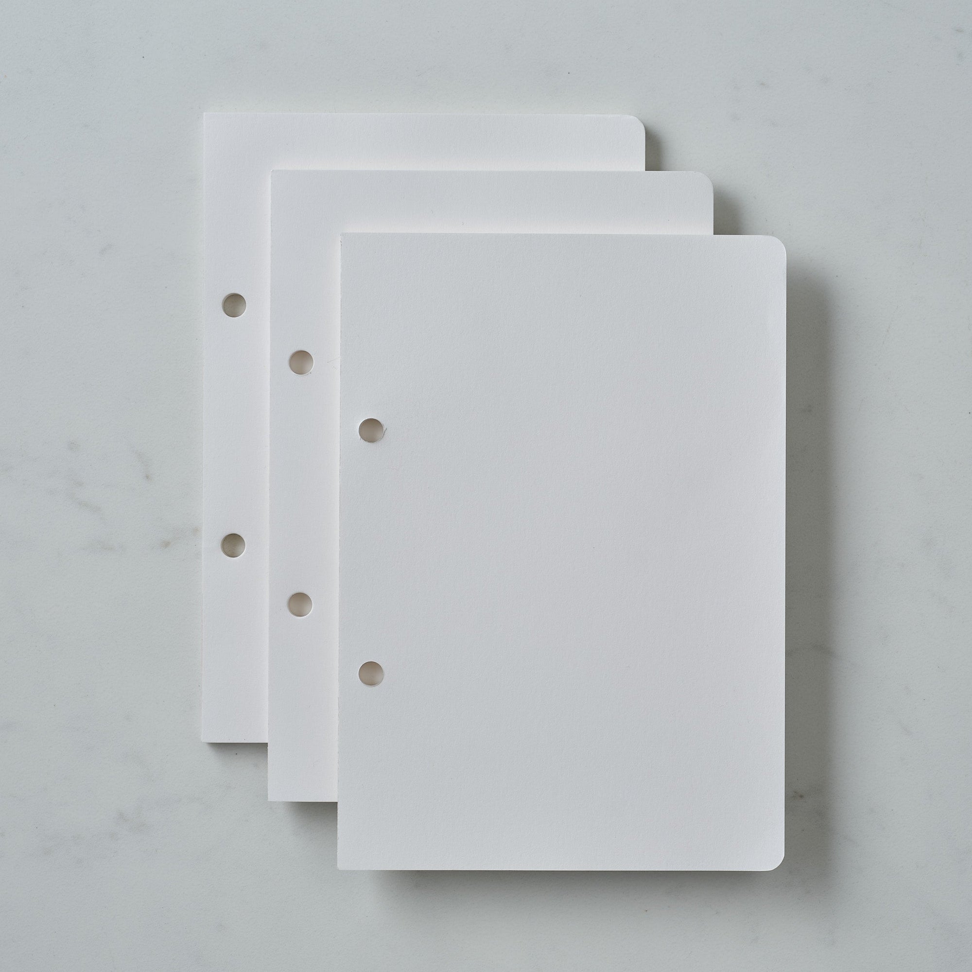 Set of three plain page refills for the Studio pad refillable, customisable notebook and organiser