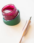 Tilt Ivy Ink Pot Holder with acrylic ink pot filled with calligraphy ink and the Flourish Calligraphy Pen