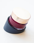 Tilt Midnight Ink Pot Holder with rose gold lidded ink pot filled with calligraphy ink
