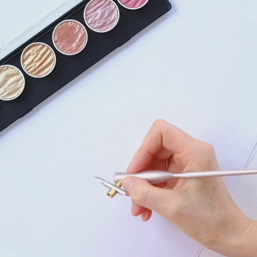 A video demonstrating The 'One Dip Wonder' ink reservoir used on an oblique Flourish calligraphy pen