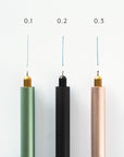 Three Lumos pens installed with three different sized fineliner tips (0.1. 0.2 & 0.3). Pen and line of tip annotated to show size and displayed on a white background.