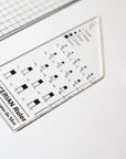 A close up of the Spencerian calligraphy ruler by Aquino da Silva