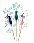 Three different versions of the Bloom modern calligraphy pen (both obliqye and straight settings) on a background of illustrations in ink