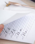 An example of modern calligraphy in the Tom's Studio A5 calligraphy practice pad