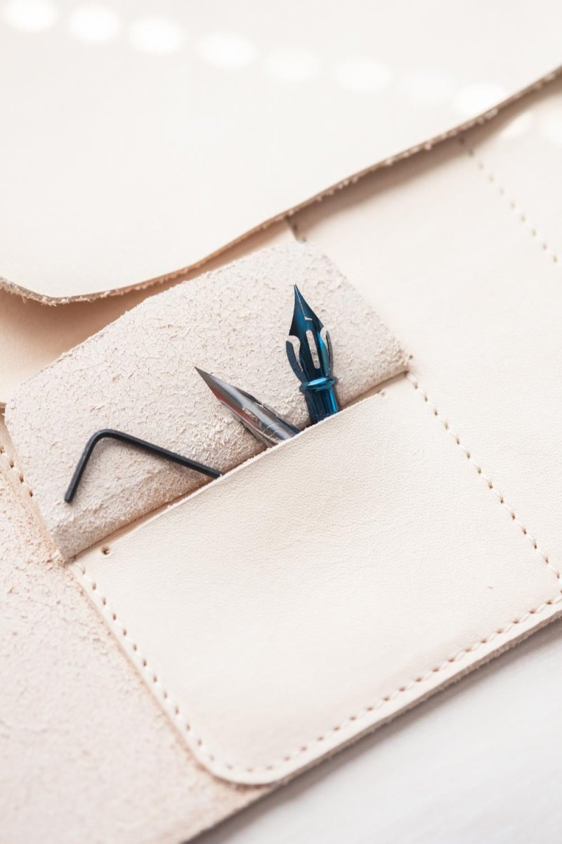 A close up of the nib storage pocket on the Leather Pen Roll, handmade by Edward de Lacy