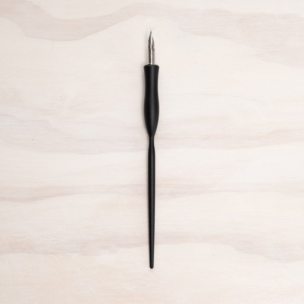 Flourish straight calligraphy pen in black fitted with a nikko g nib