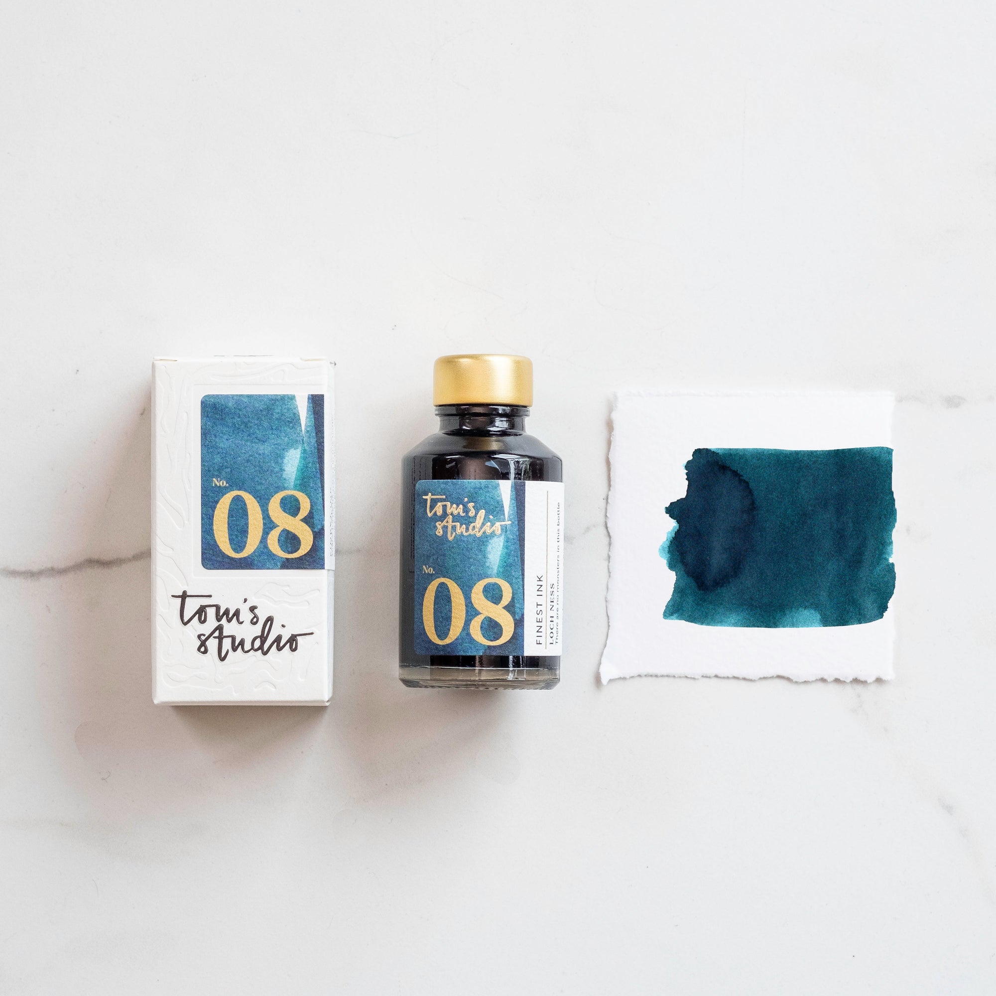 Tom's Studio Loch Ness Fountain Pen Ink – featuring the packaging, bottle and a swatch on paper