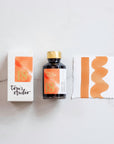Tom's Studio Marmalade Fountain Pen Ink – featuring the packaging, bottle and a swatch on paper