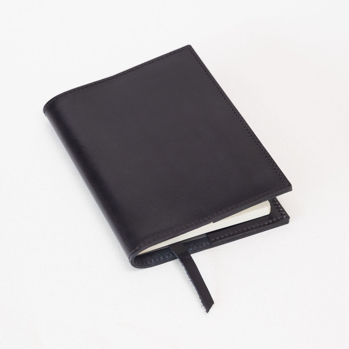 http://tomsstudio.com/cdn/shop/products/handmade-leather-notebook-journal-black-515617_1200x1200.jpg?v=1642070318