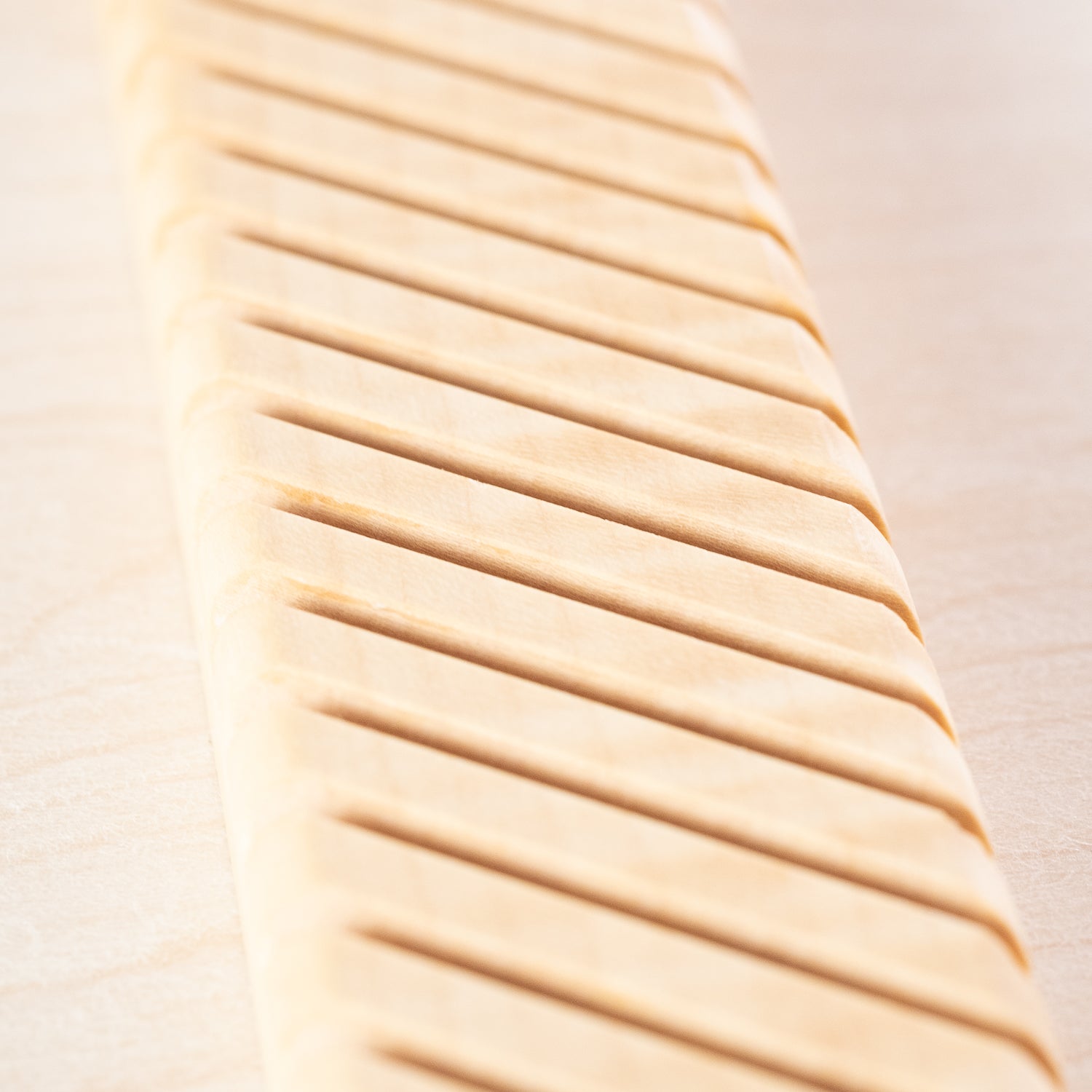 A detail shot of the Envelope Rack crafted from beautiful British sycamore, made by Keiyosa