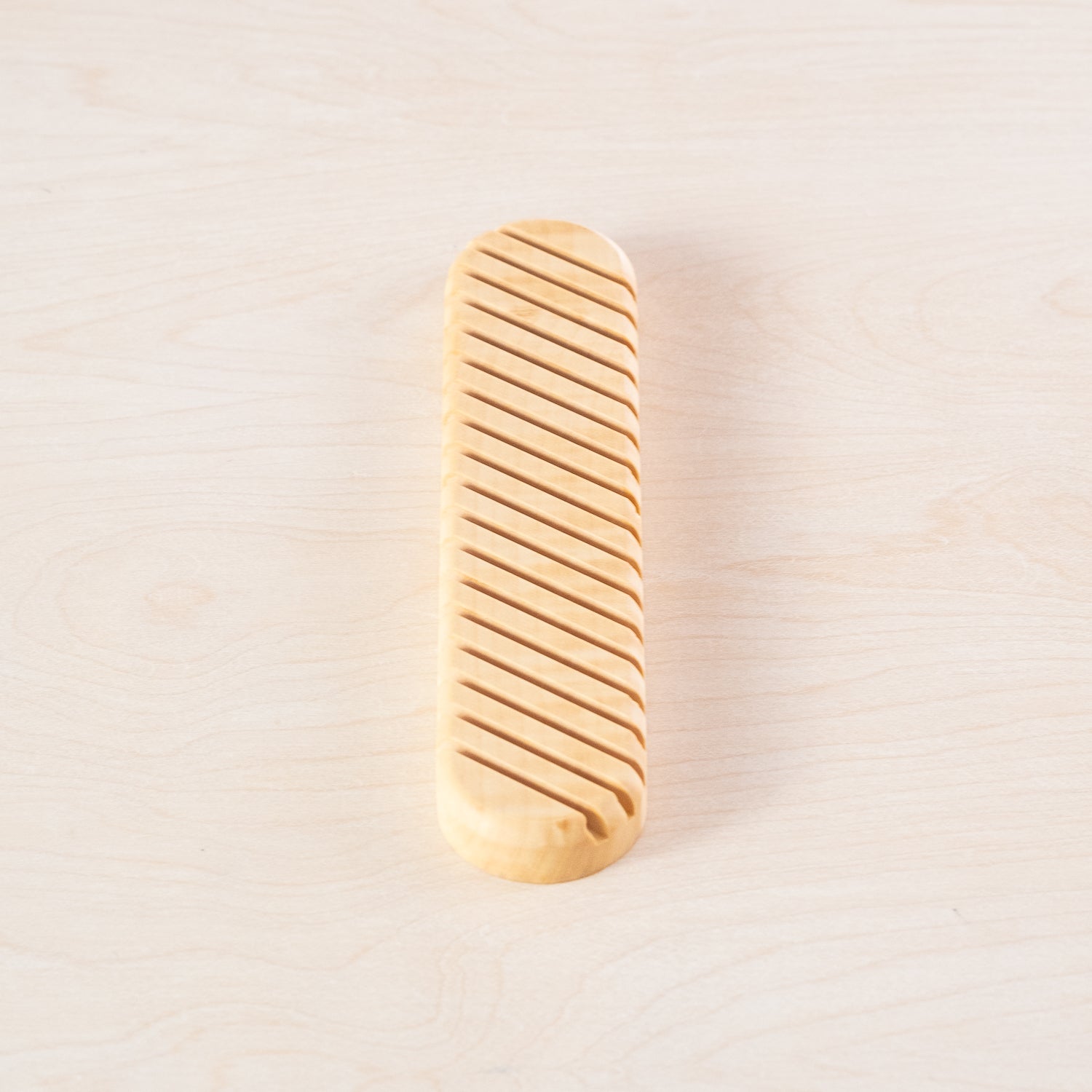 A shotof the Envelope Rack crafted from beautiful British sycamore, made by Keiyosa