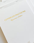 Stack of Copperplate Practice Pads by Logos Calligraphy - Uppercase Letters
