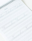A sample page from the Cursive Practice Workbook by Logos Calligraphy