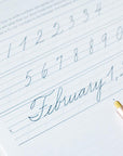 A sample page from the Cursive Practice Workbook by Logos Calligraphy - with Lumos refillable pen