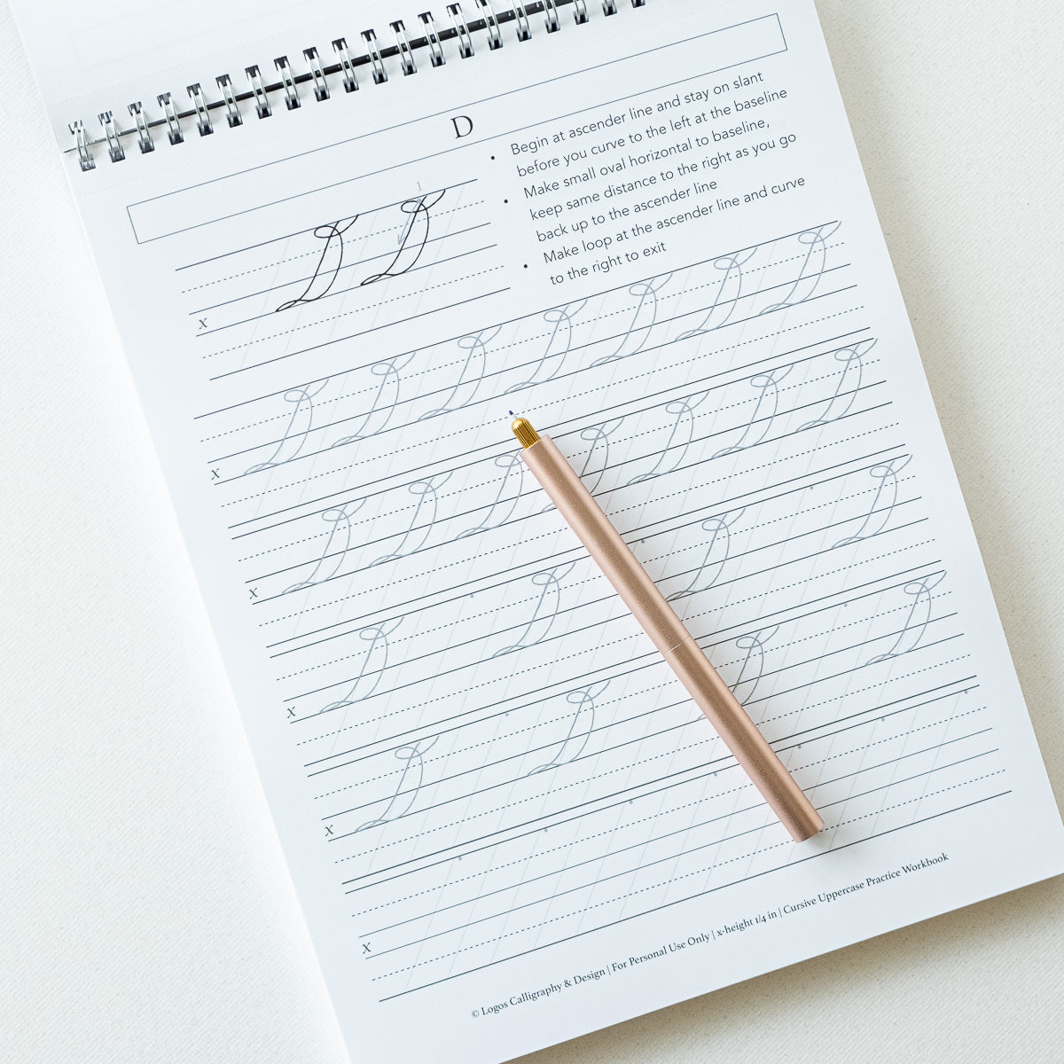 A sample page from the Cursive Practice Workbook by Logos Calligraphy