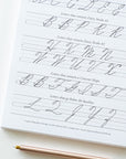 A sample page from the Cursive Practice Workbook by Logos Calligraphy