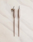Two calligraphy pens one straight nib and one oblique nib pen side by side