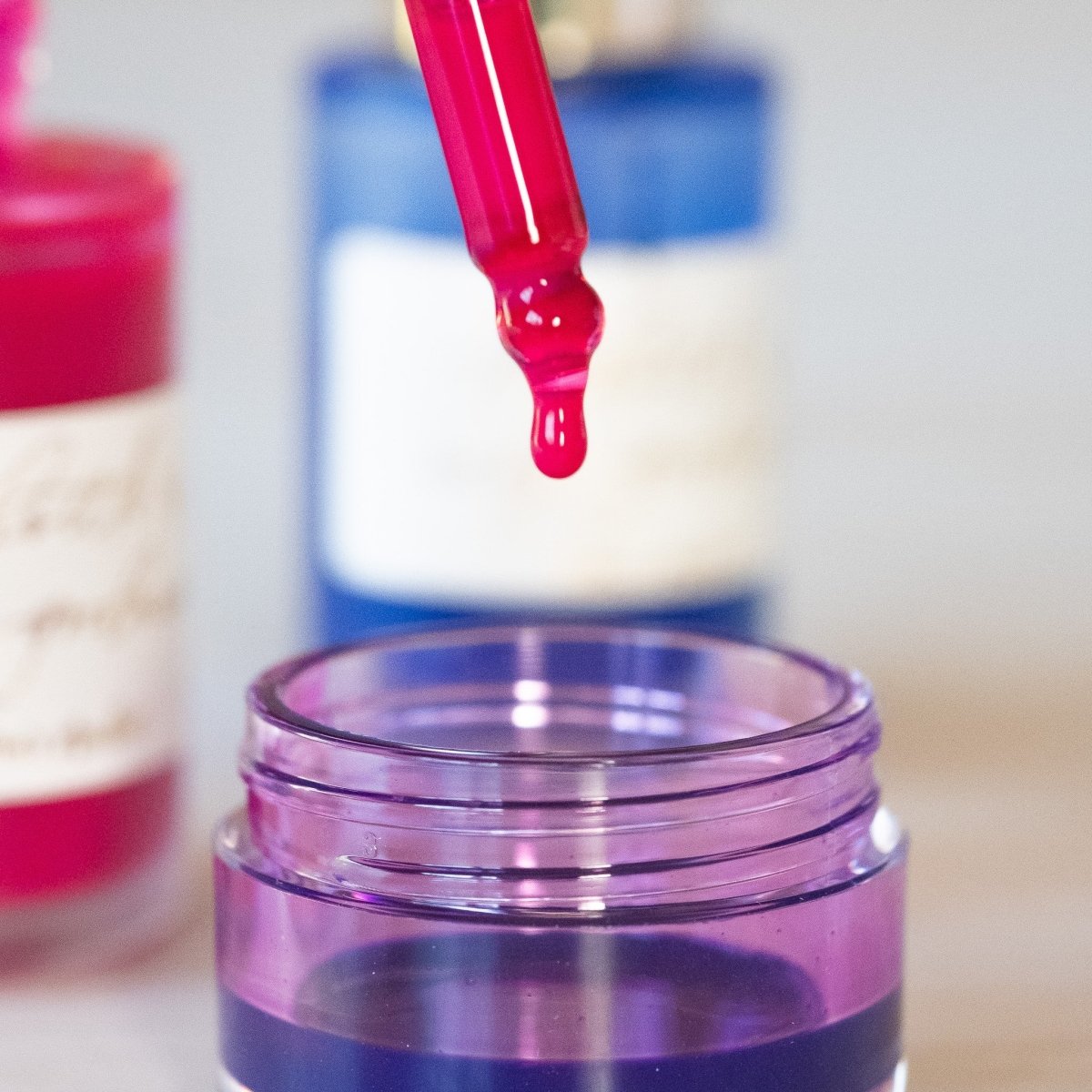 Make Your Own Ink gift set a close up of the dropper lid dripping into an ink jar