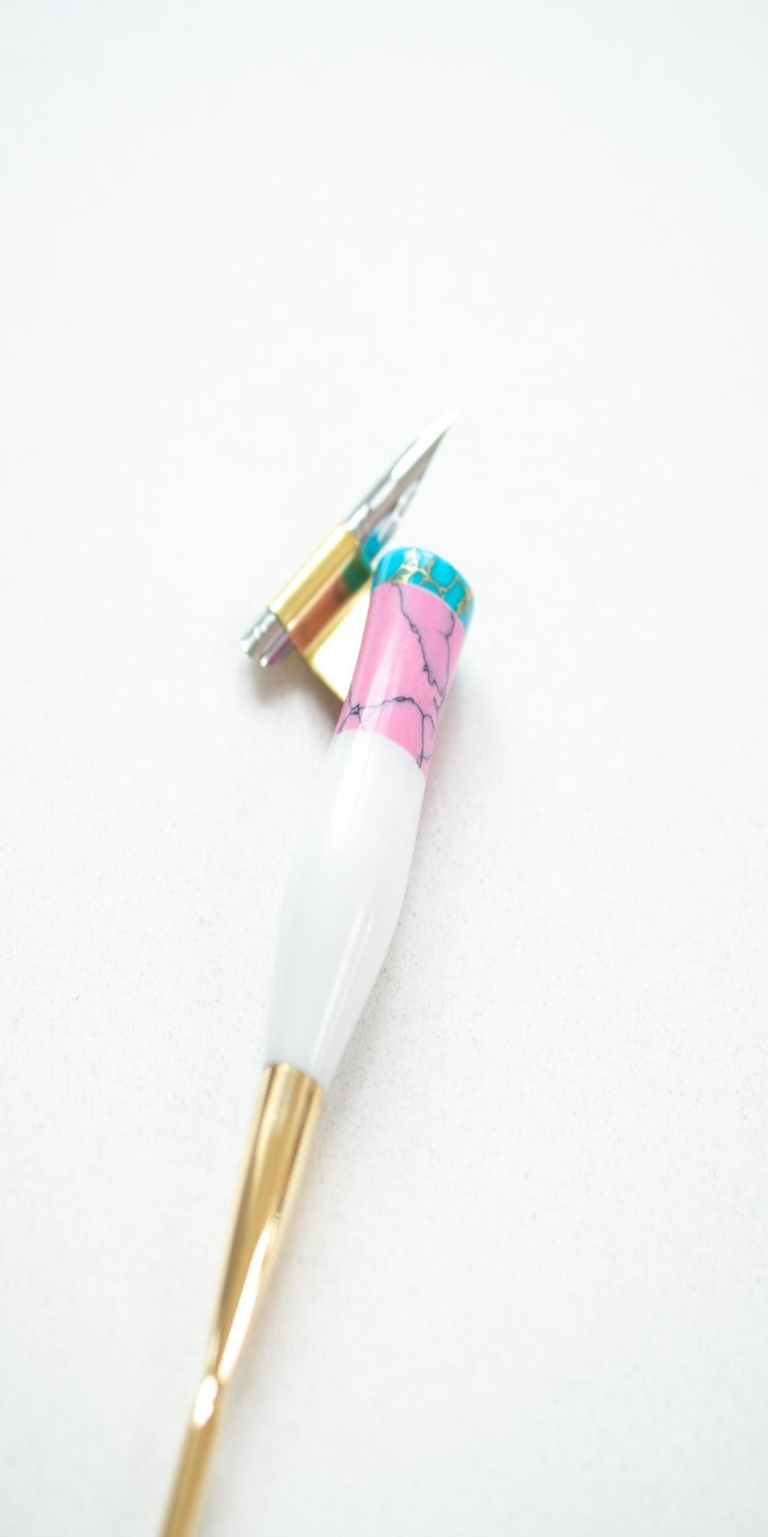Pink + Turquoise - Marble Oblique calligraphy pen on white desk