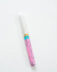 Pink + Turquoise Studio Fountain Pen with a flexible nib with the white lid on