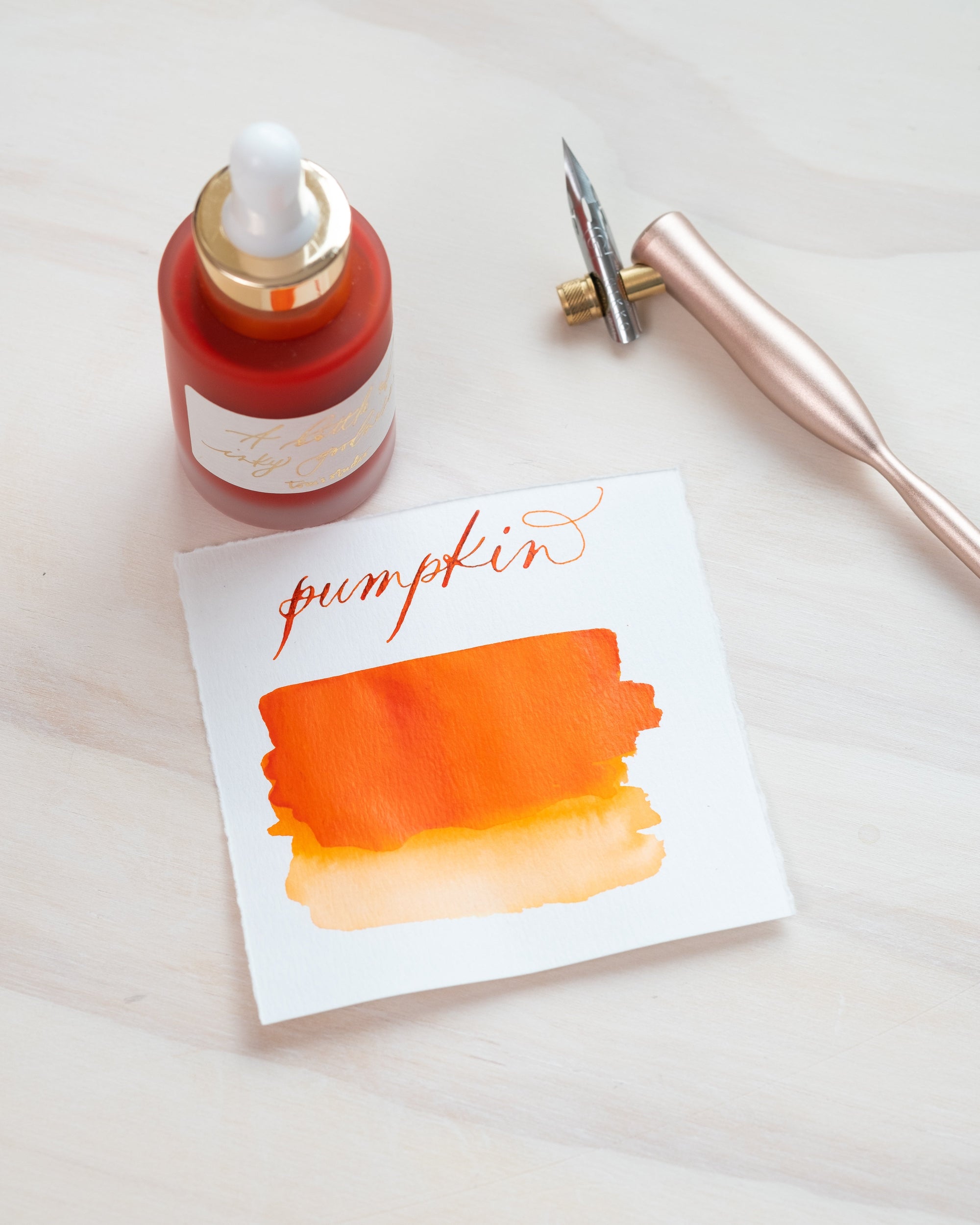 Pumpkin - Calligraphy Ink in bottle with swatch showing the ink colour