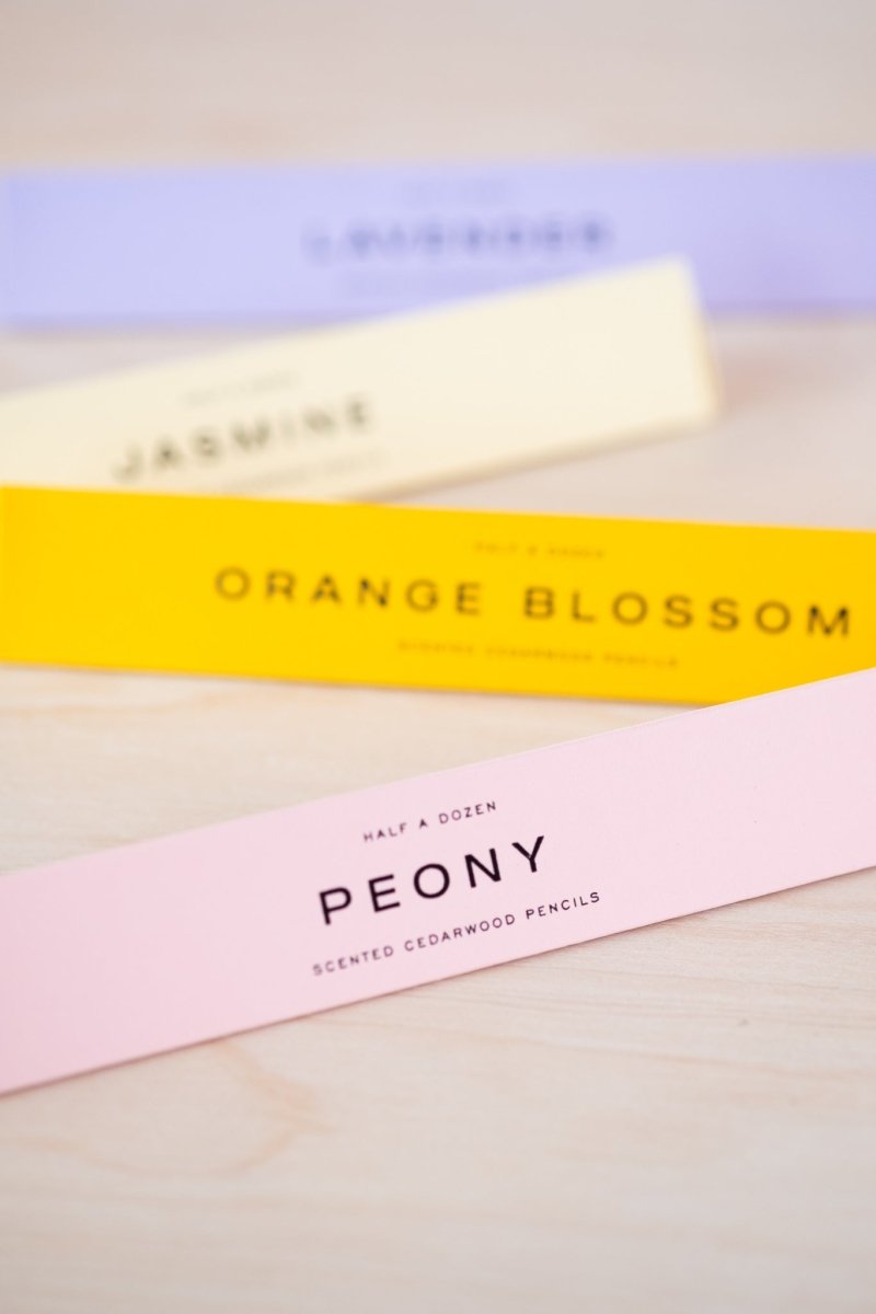Peony scented pencils in their box with other scents in the background