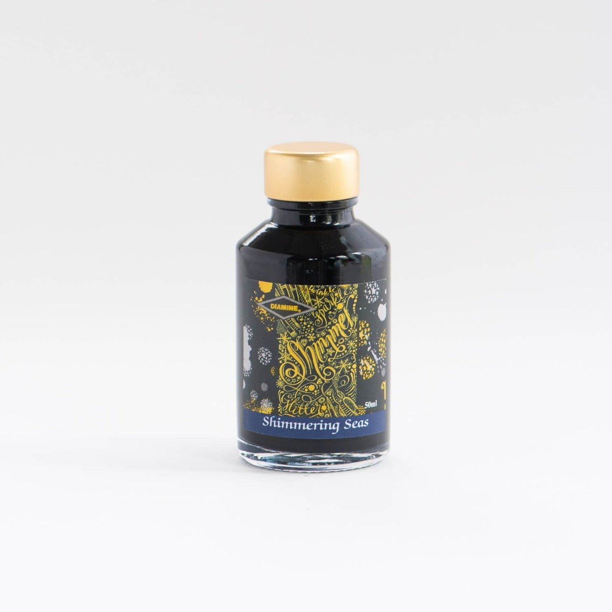Shimmering Seas - Shimmer Fountain Pen Ink - a close up of the ink bottle