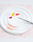 Fine Bone China Artist's Palette by Wendy Tournay with paint on and watercolour background