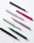 The Pocket fountain pen showing various colours and nibs