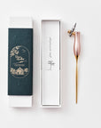 The Bloom calligraphy pen with oblique nib setting in Peony with packaging