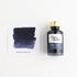 Toms Studio Fibre Tip Ink in Midnight – shown swatched on paper and in the bottle