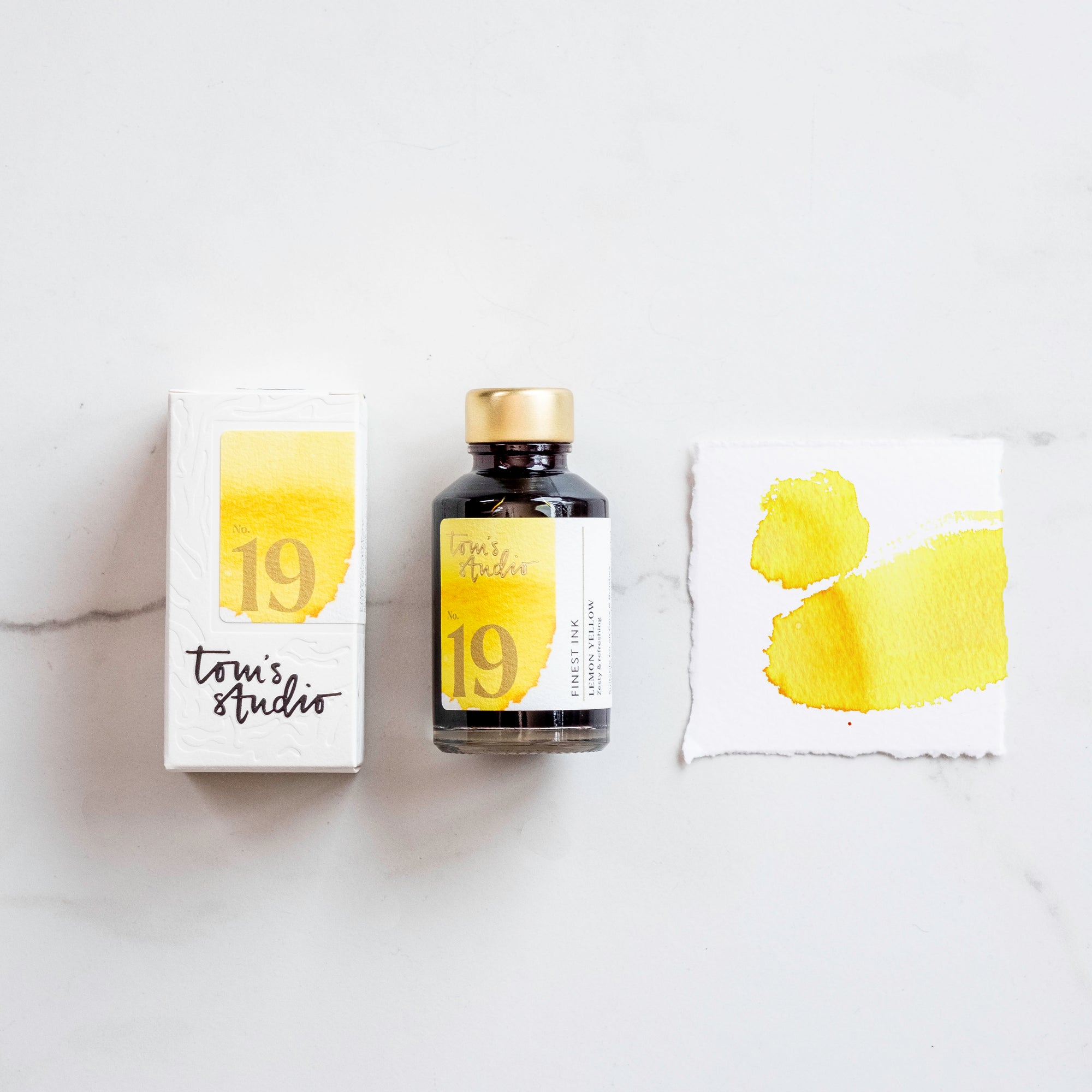 Tom's Studio Lemon Yellow Fountain Pen Ink – featuring the packaging, bottle and a swatch on paper