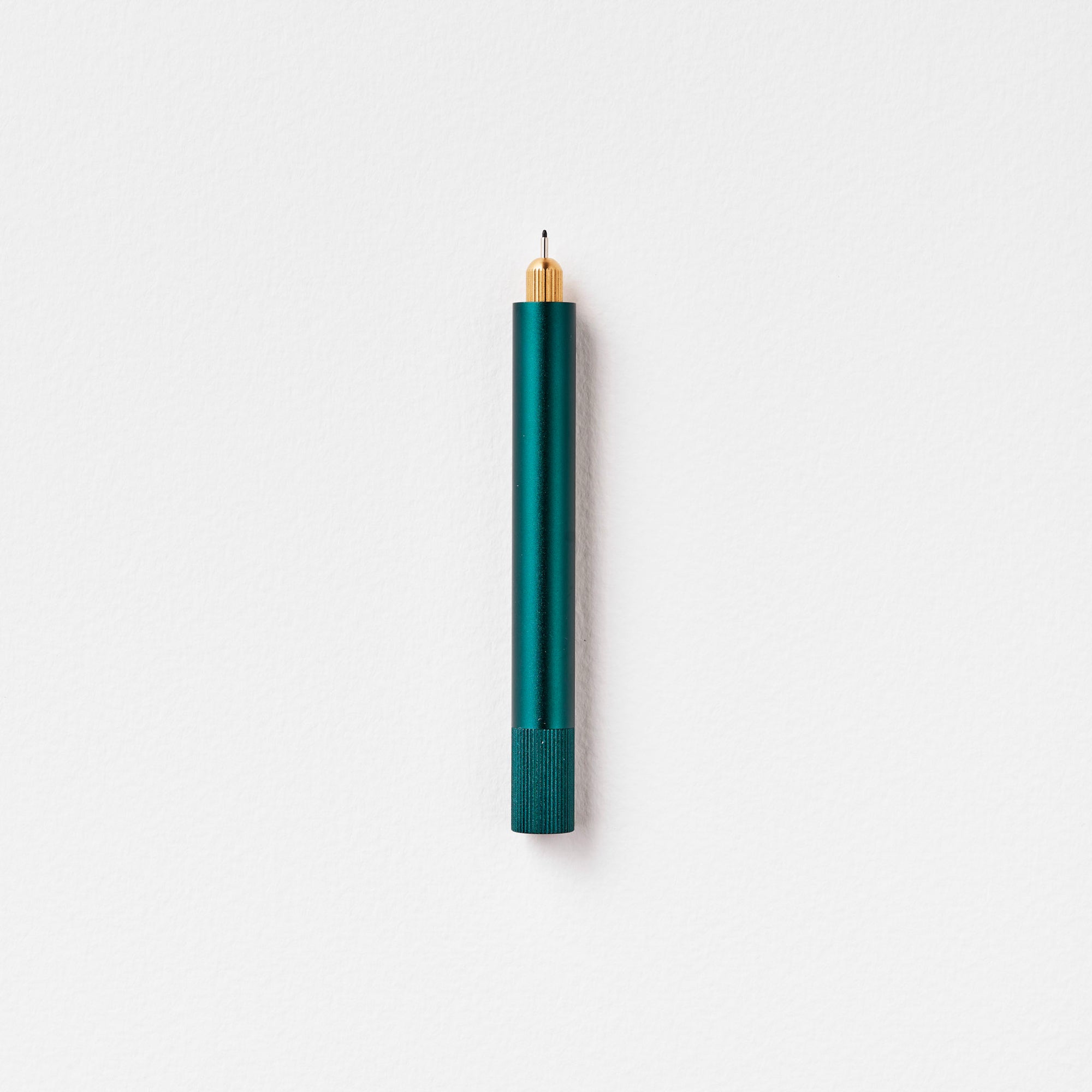 The Lumos Mini Refillable Pen in Ivy on white background