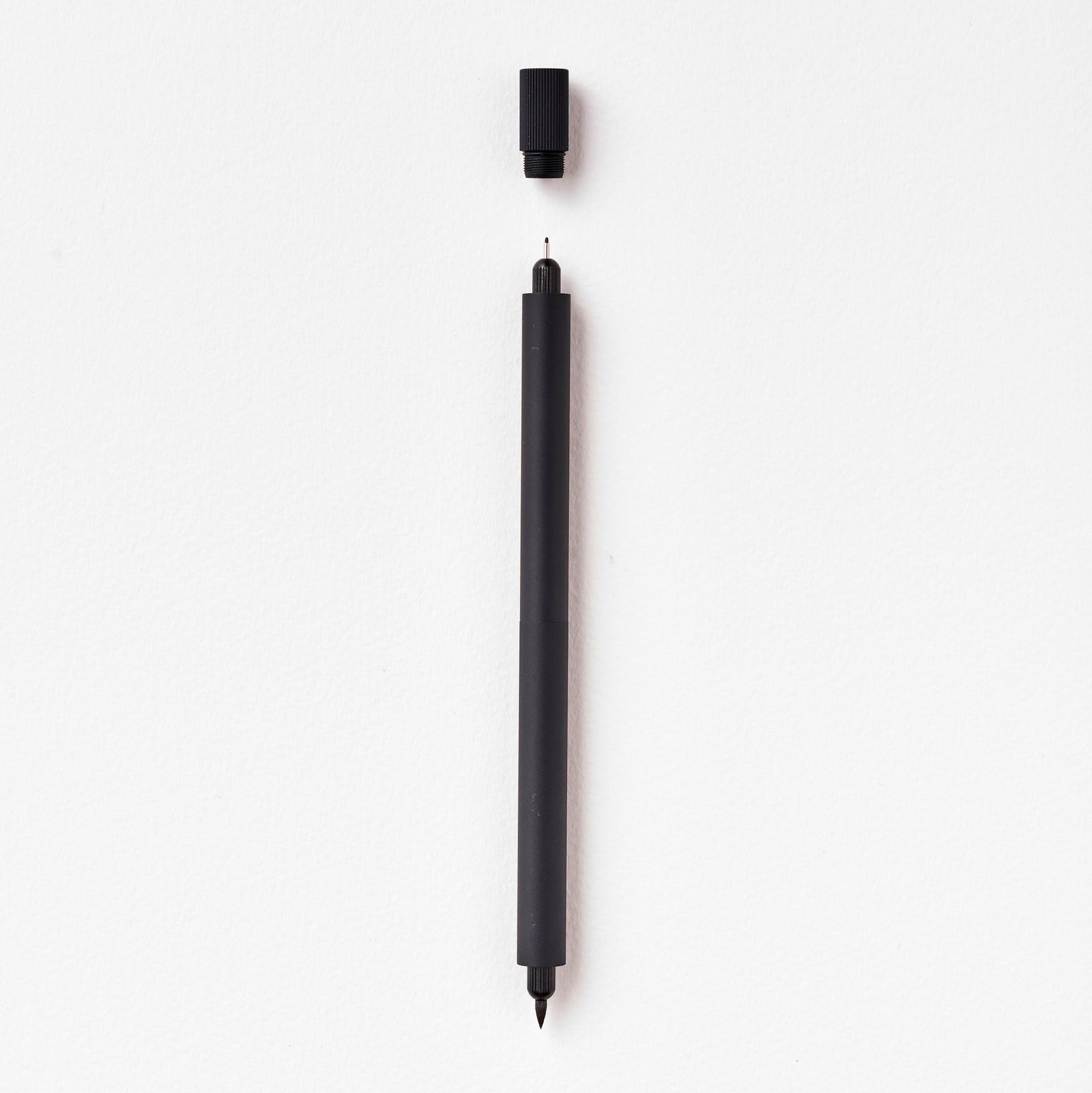 The Lumos Pro Duo Refillable Pen in Matte Black on white background